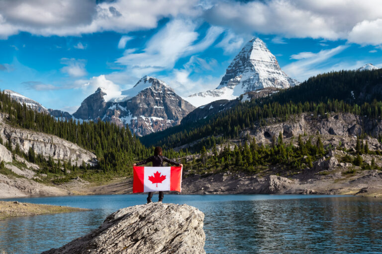 Girl Holding a Canadian National Flag.